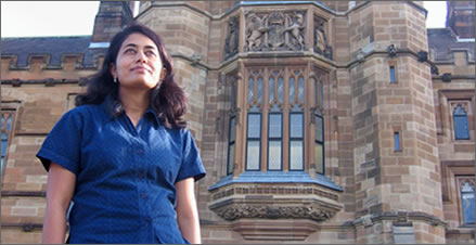 Picture showing a woman in front of an university